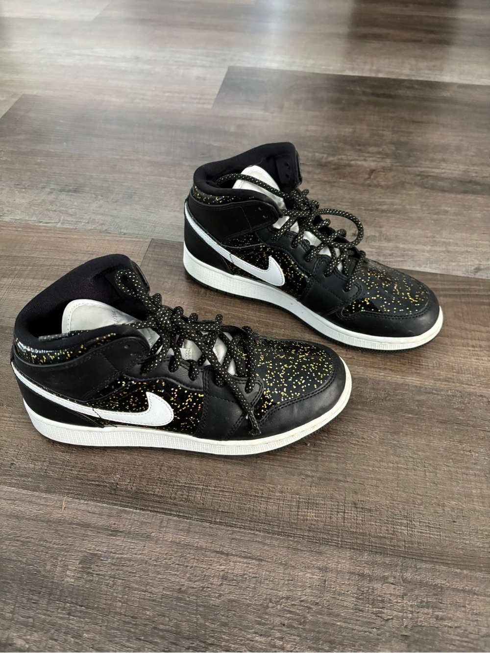 Jordan women’s Black High-Top Sneakers with White Swoosh and Gold Fleck - Picture 3 of 7